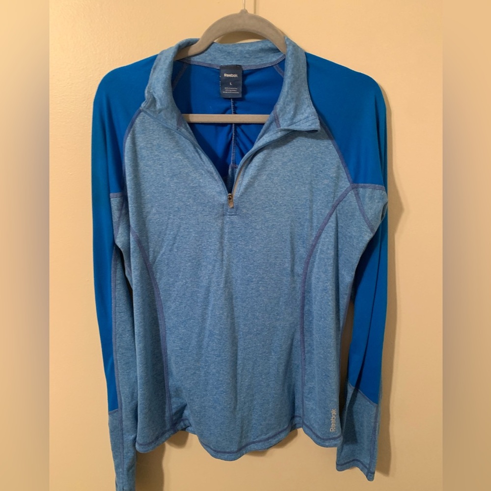 Reebok shirt. 3